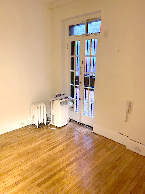 Explore flexible office space in Upper East Side, NYC, a serene space for therapists. Floor, Flooring, Door, Wood, Hardwood.